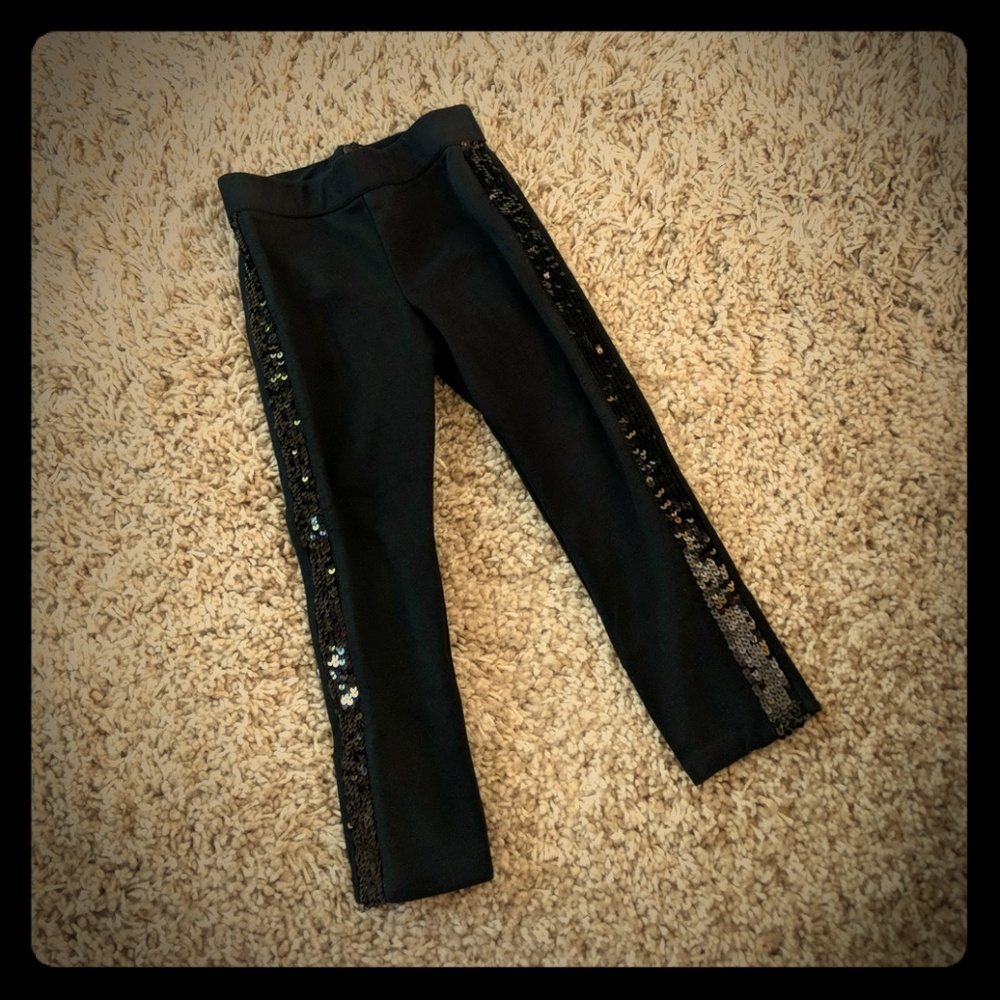Girls stretchy black pants with sequins - size 4